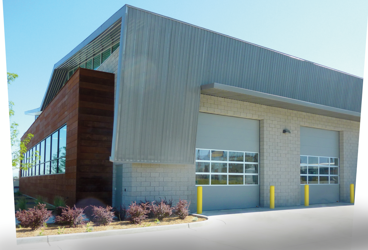 A team of experts doing a garage door replacement for a residential home.